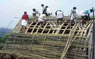 Toda Working on Roof