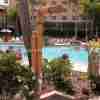 faux bamboo poles poolside