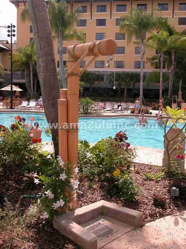 faux bamboo poles poolside